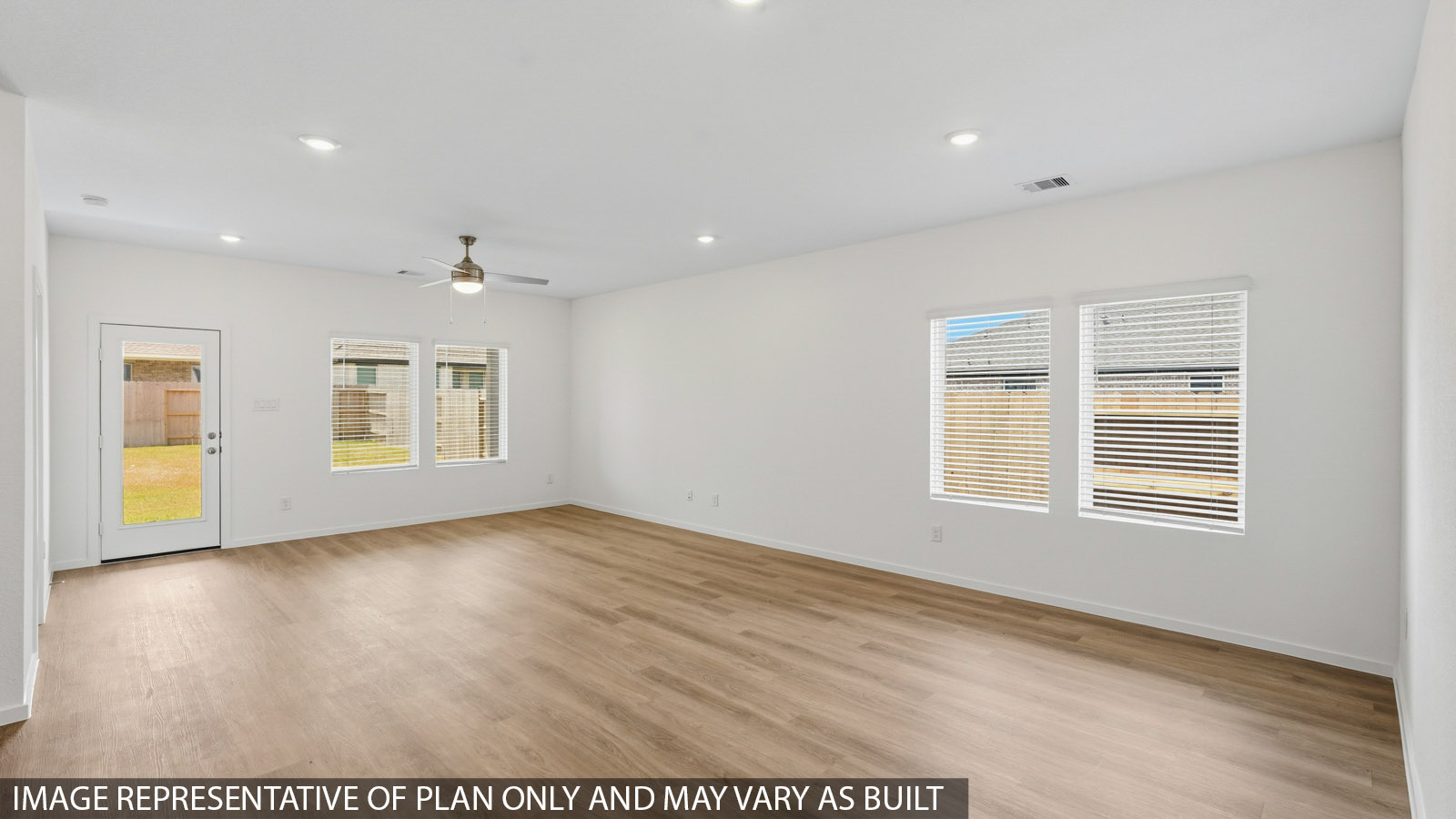 Open concept living, dining, and kitchen area