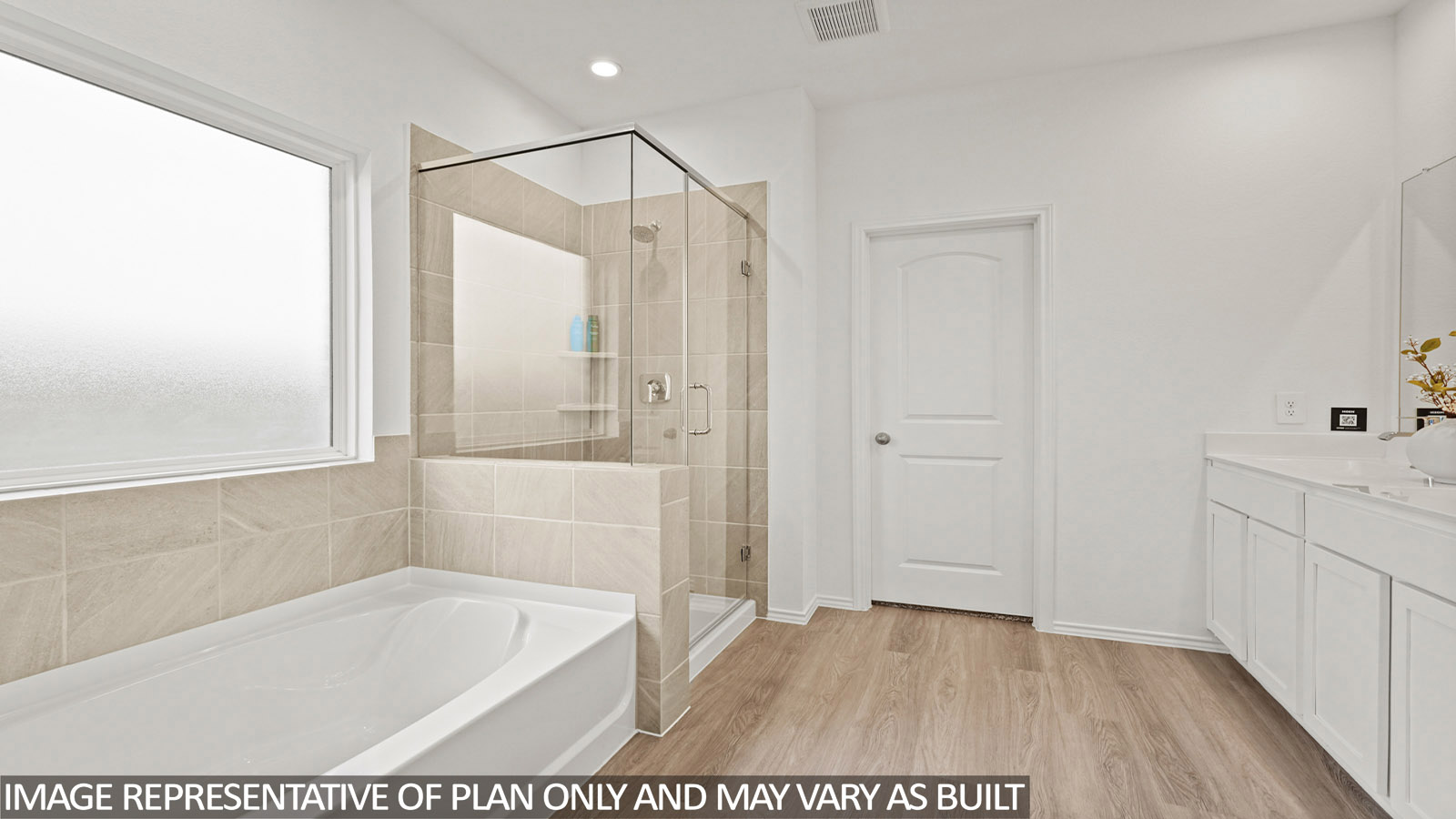 Primary bathroom with tub and shower