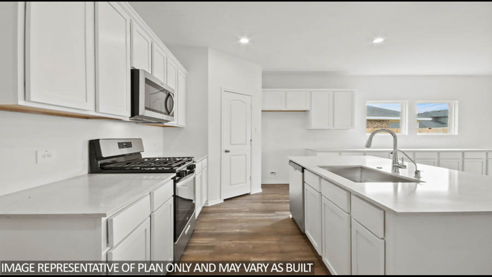 Open concept living, dining, and kitchen area