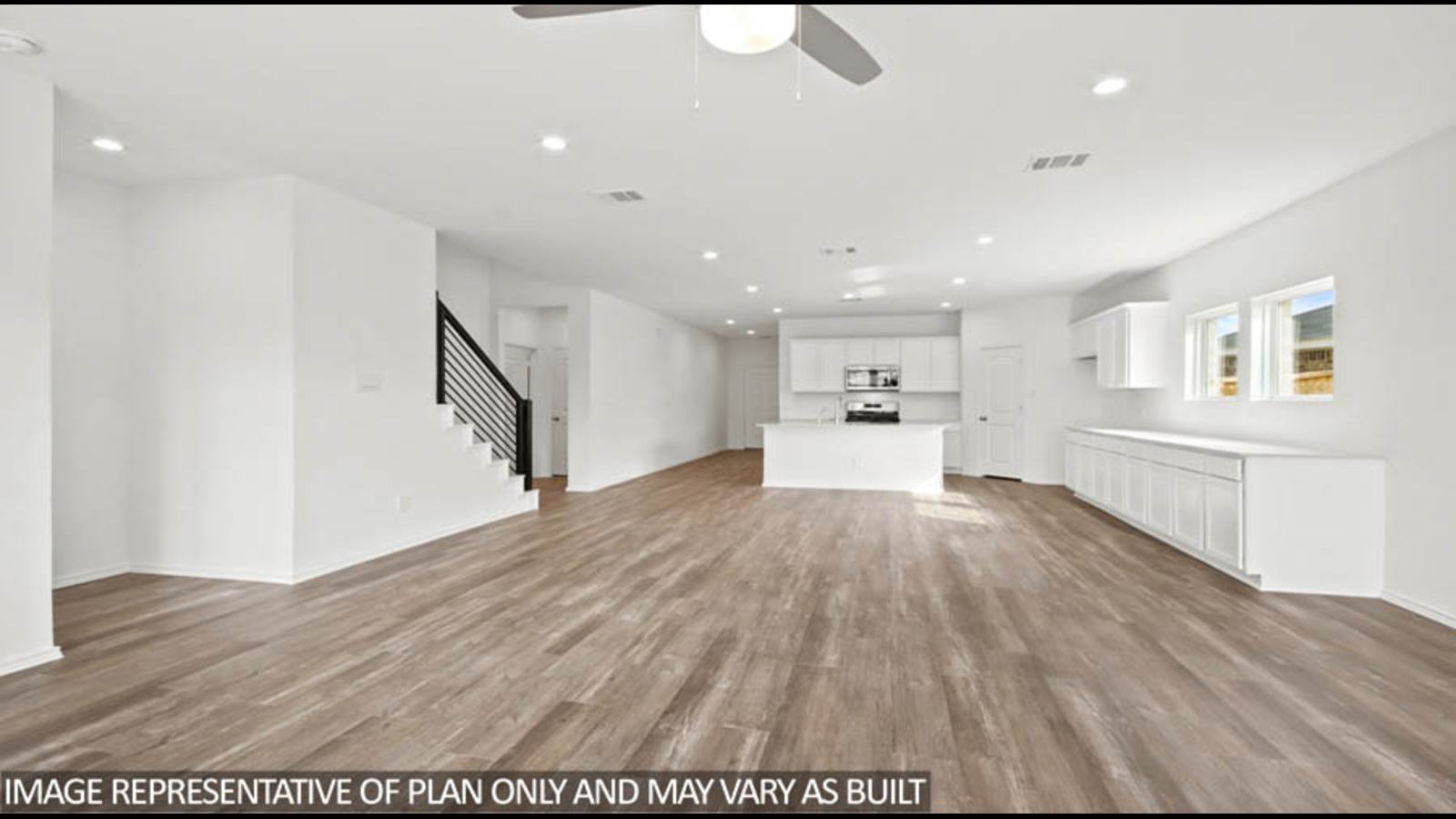 Open concept living, dining, and kitchen area