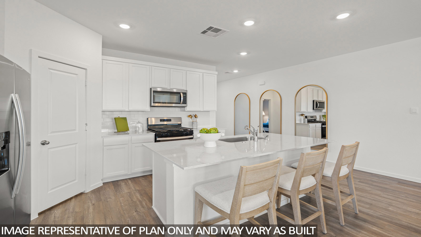 Open concept living, dining, and kitchen area