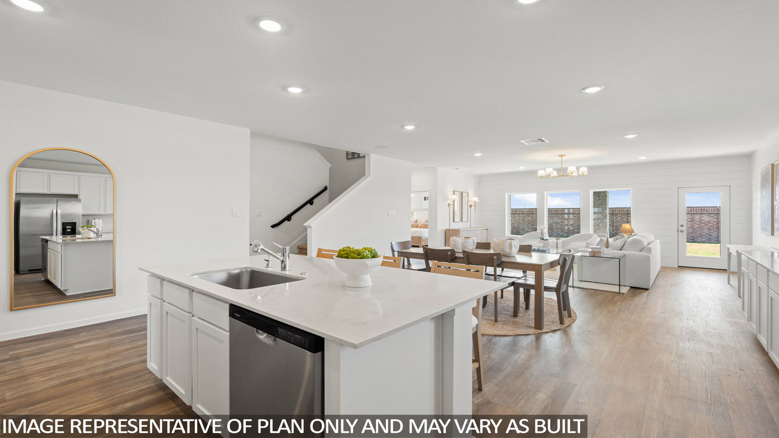 Open concept living, dining, and kitchen area