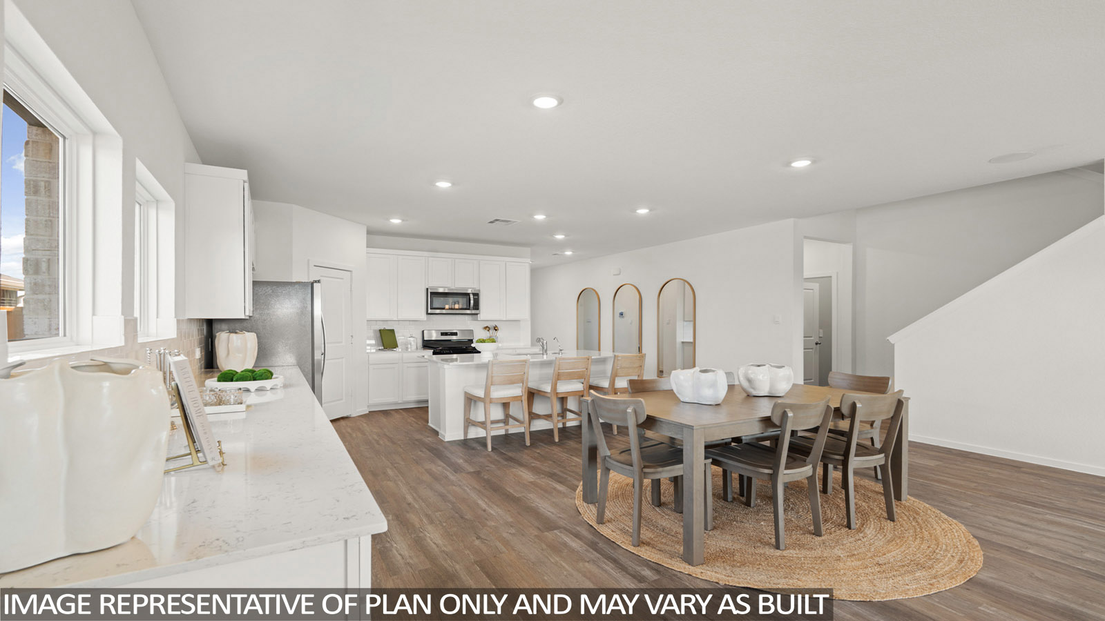 Open concept living, dining, and kitchen area