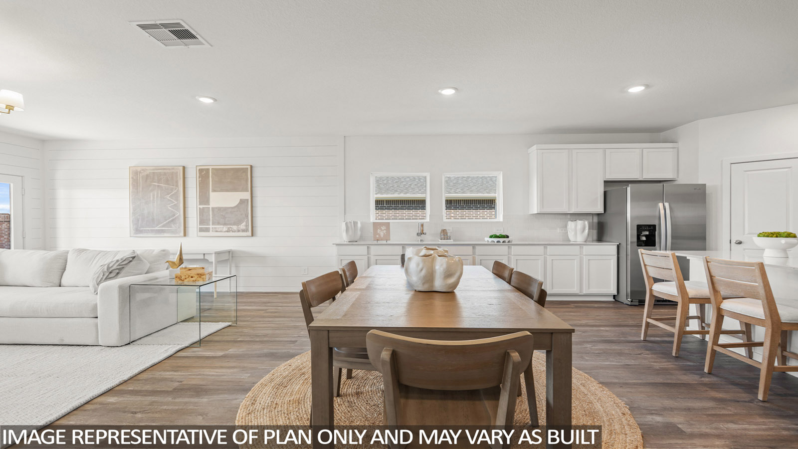 Open concept living, dining, and kitchen area