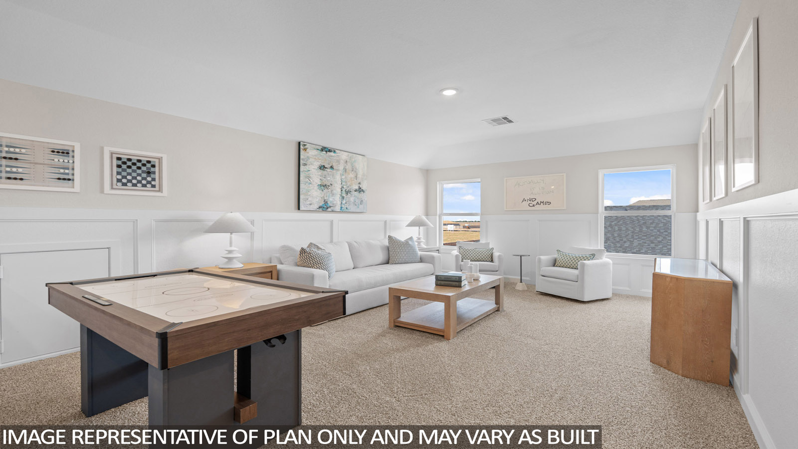 Second story game room with carpet flooring