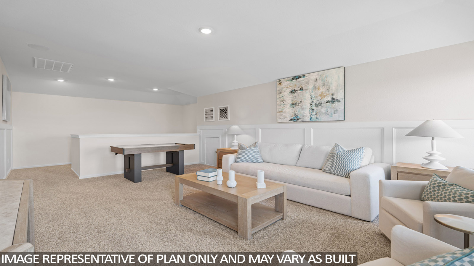 Second story game room with carpet flooring