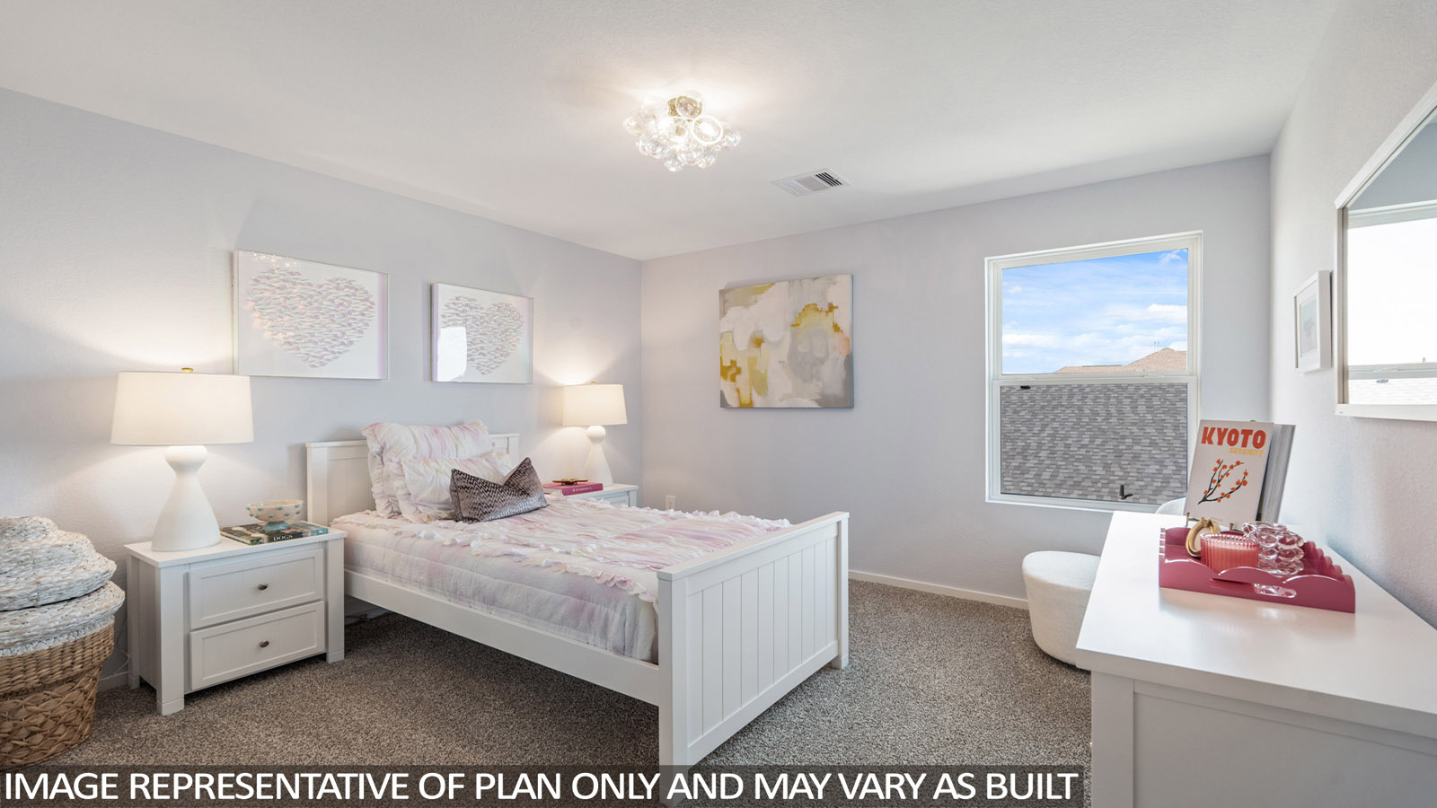 Secondary bedroom with carpet flooring