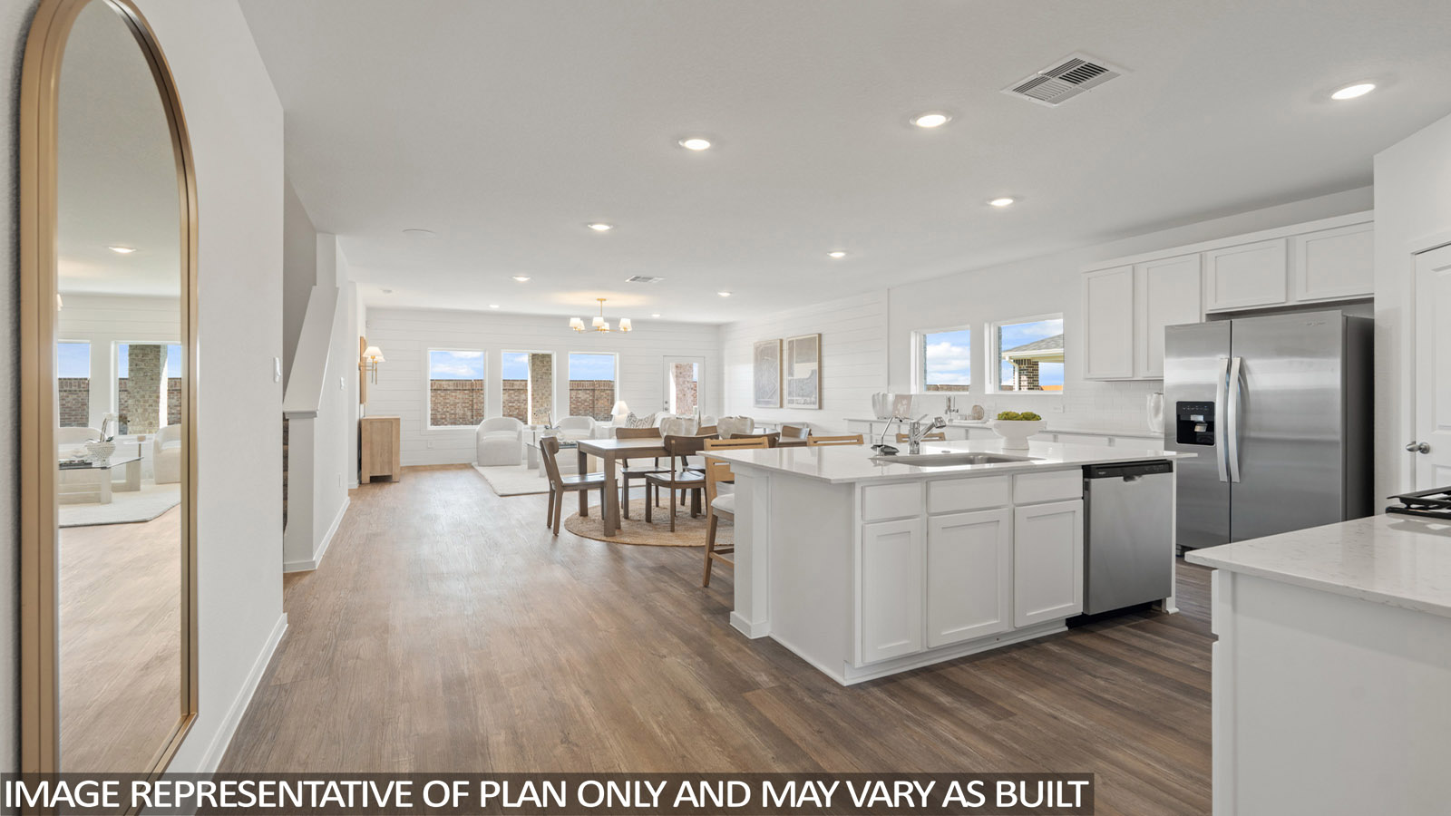Open concept living, dining, and kitchen area