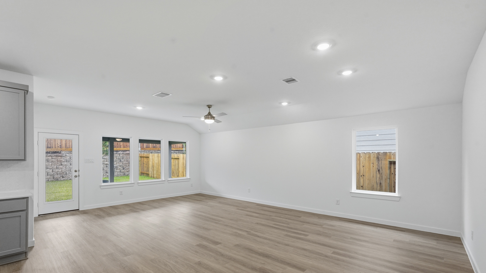 Open concept living, dining, and kitchen area