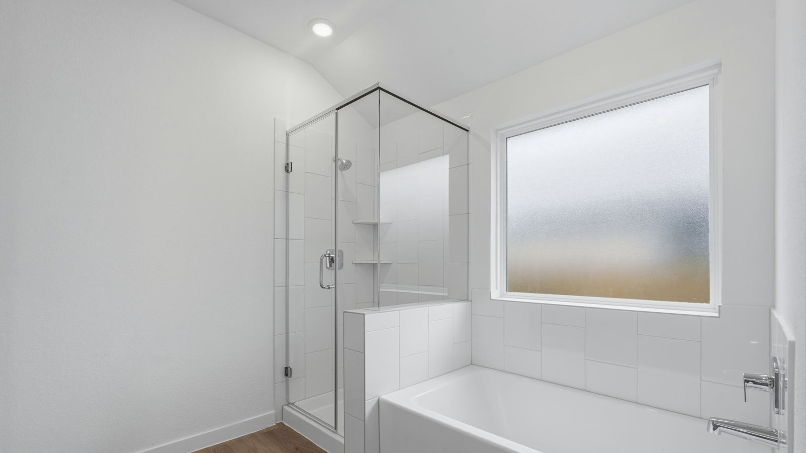 Primary bathroom with tub and shower
