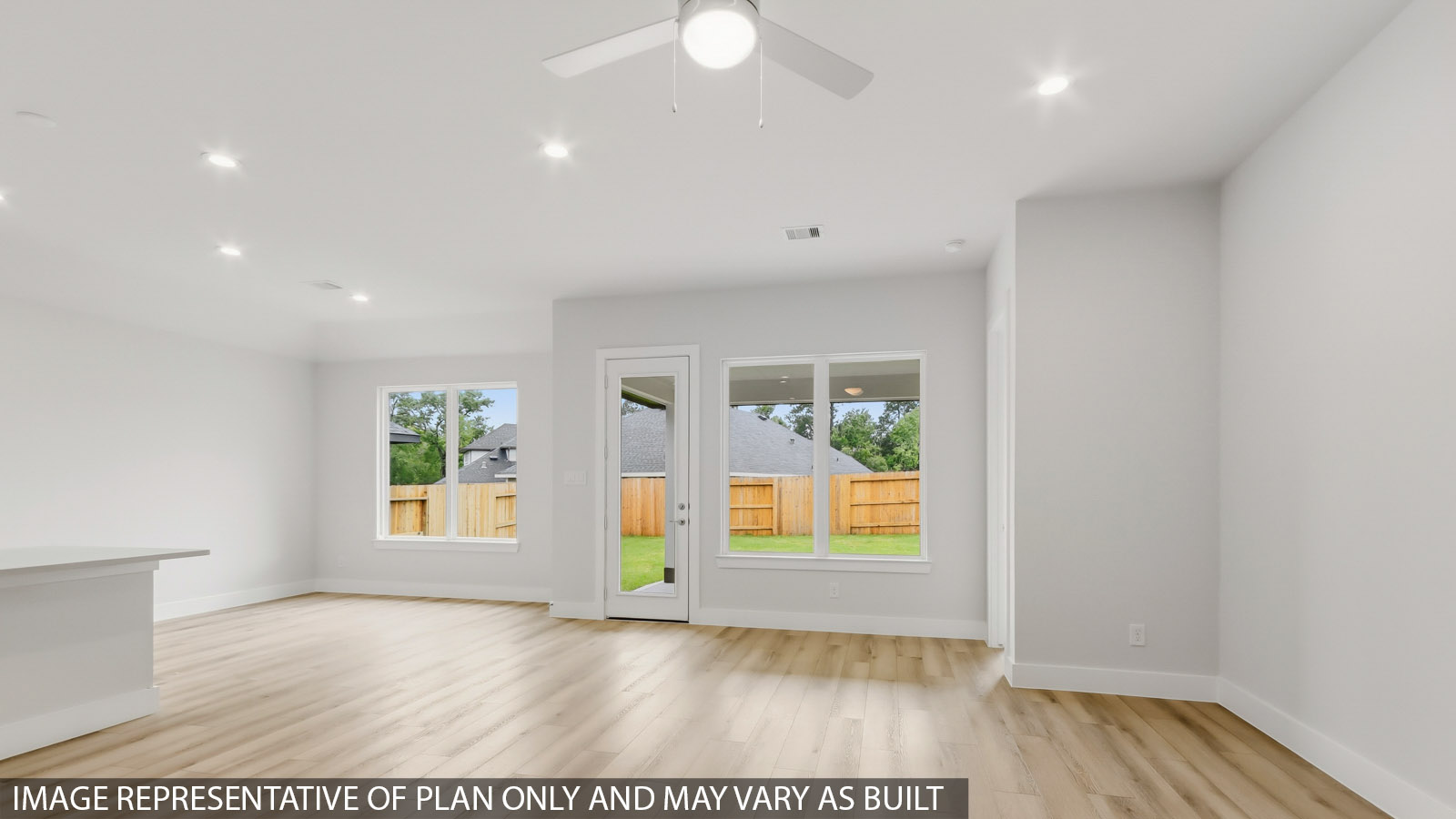 Open concept living, dining, and kitchen area