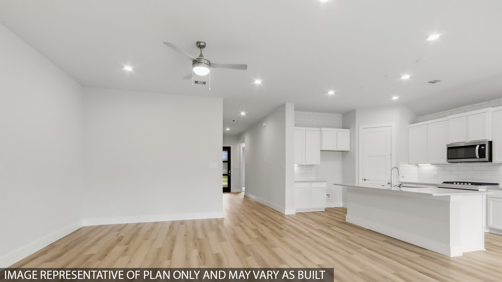 Open concept living, dining, and kitchen area
