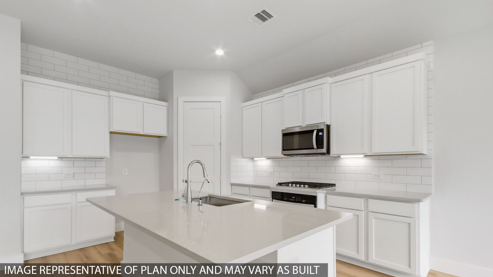 Open concept living, dining, and kitchen area
