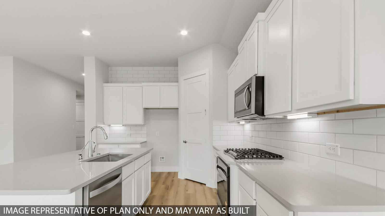 Open concept living, dining, and kitchen area