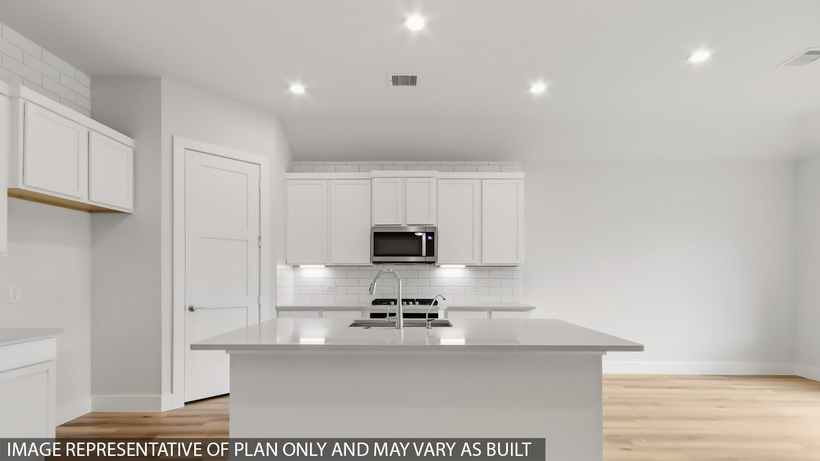 Open concept living, dining, and kitchen area