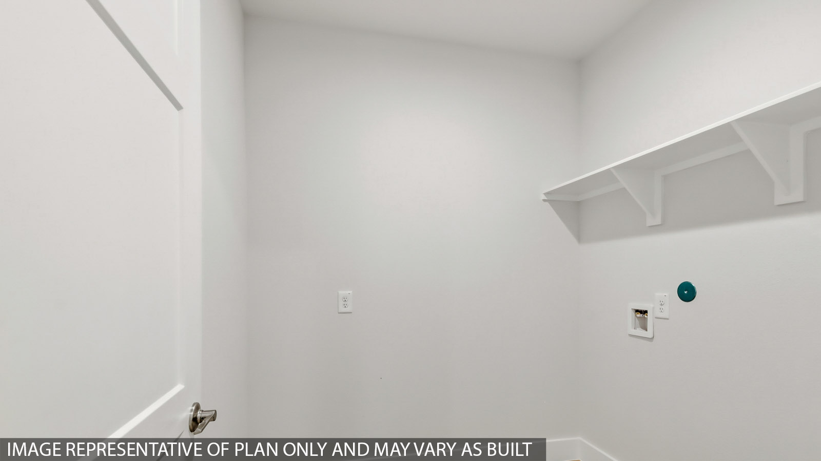 Secondary bedroom with carpet flooring