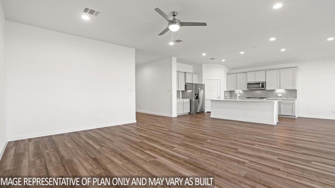 Open concept living, dining, and kitchen area