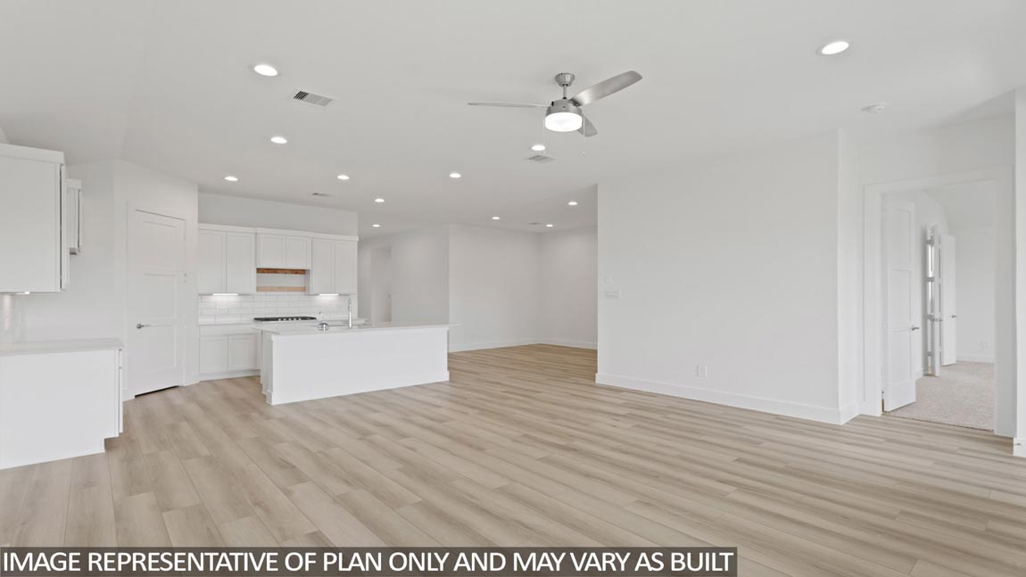 Open concept living, dining, and kitchen area