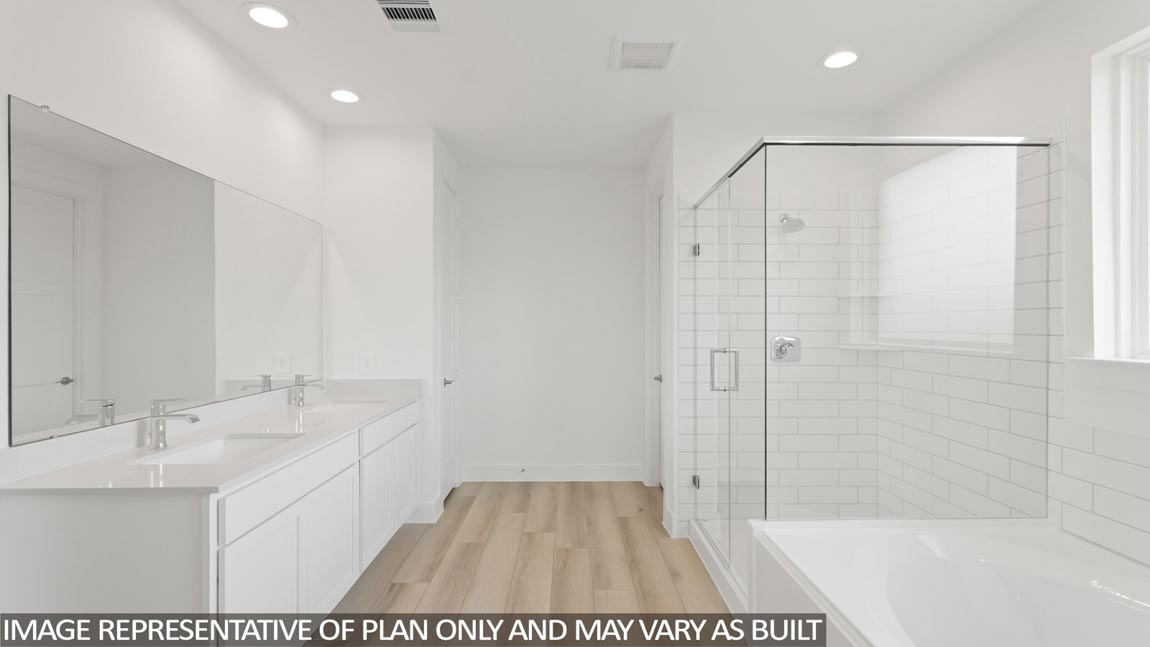 Primary bathroom with tub and shower