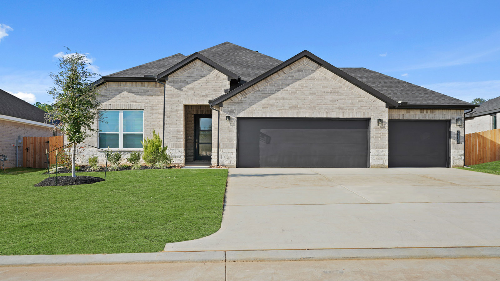 One story home with three car garage
