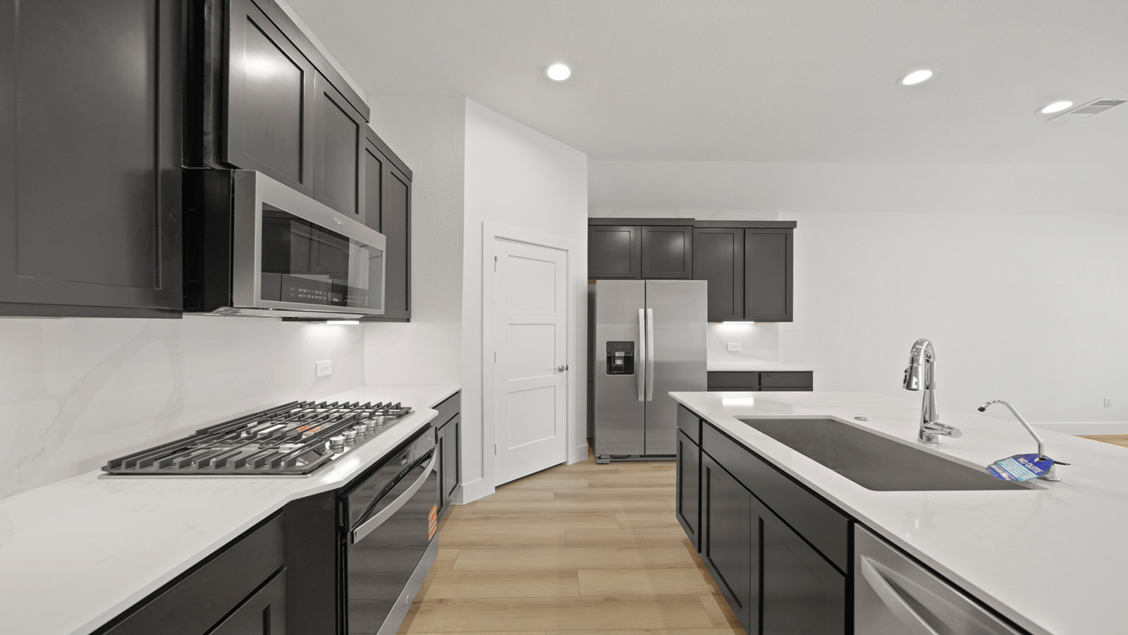 Open concept living, dining, and kitchen area