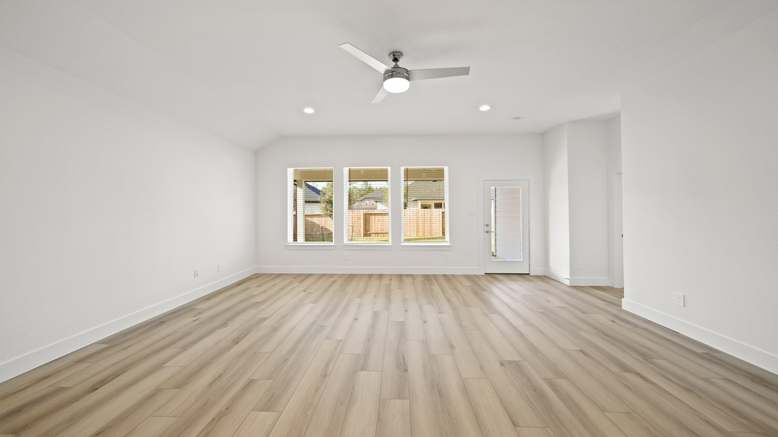 Open concept living, dining, and kitchen area