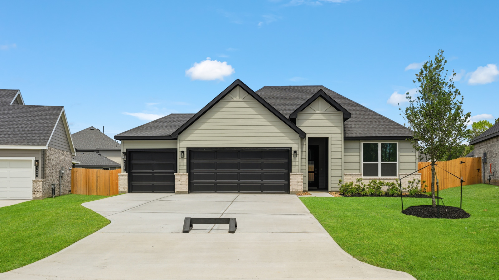 One story home with three car garage
