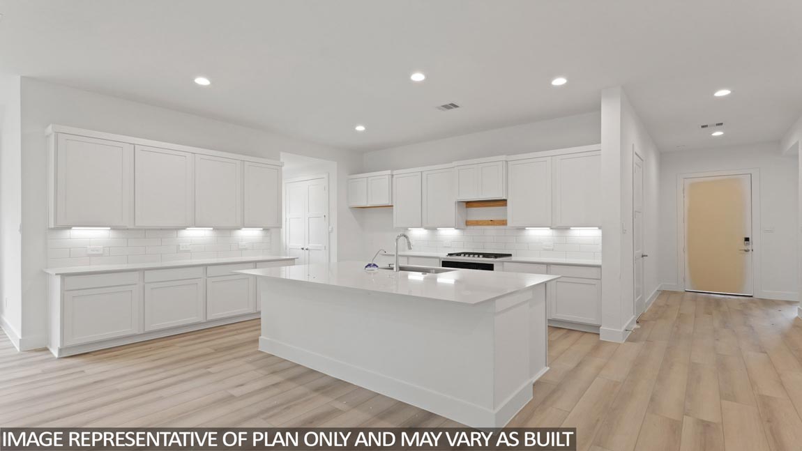 Open concept living, dining, and kitchen area