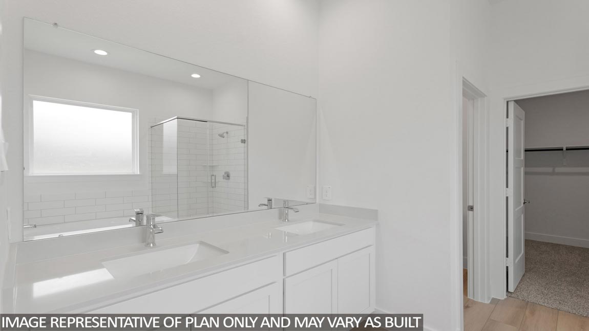Primary bathroom with tub and shower