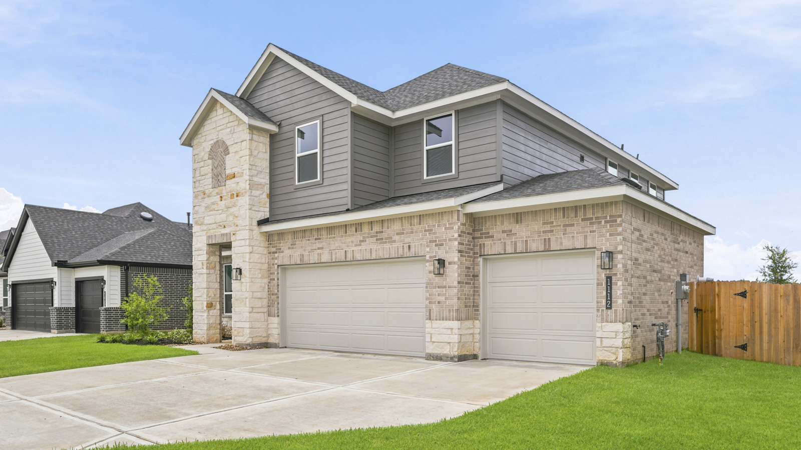 Two story home with three car garage