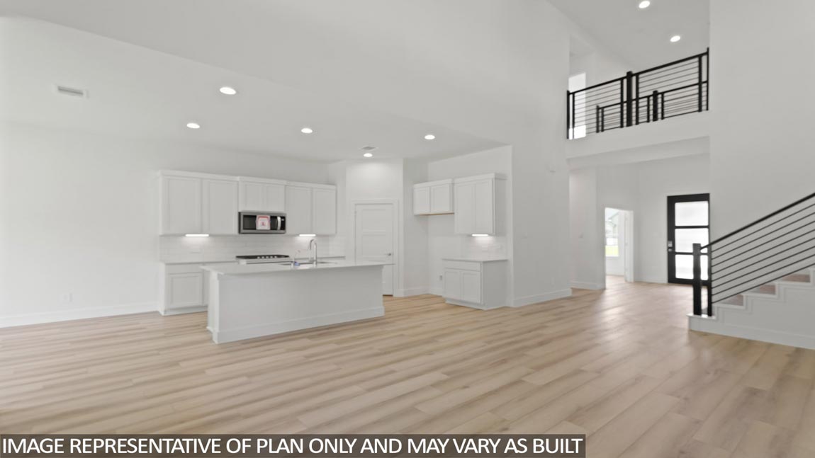 Open concept living, dining, and kitchen area