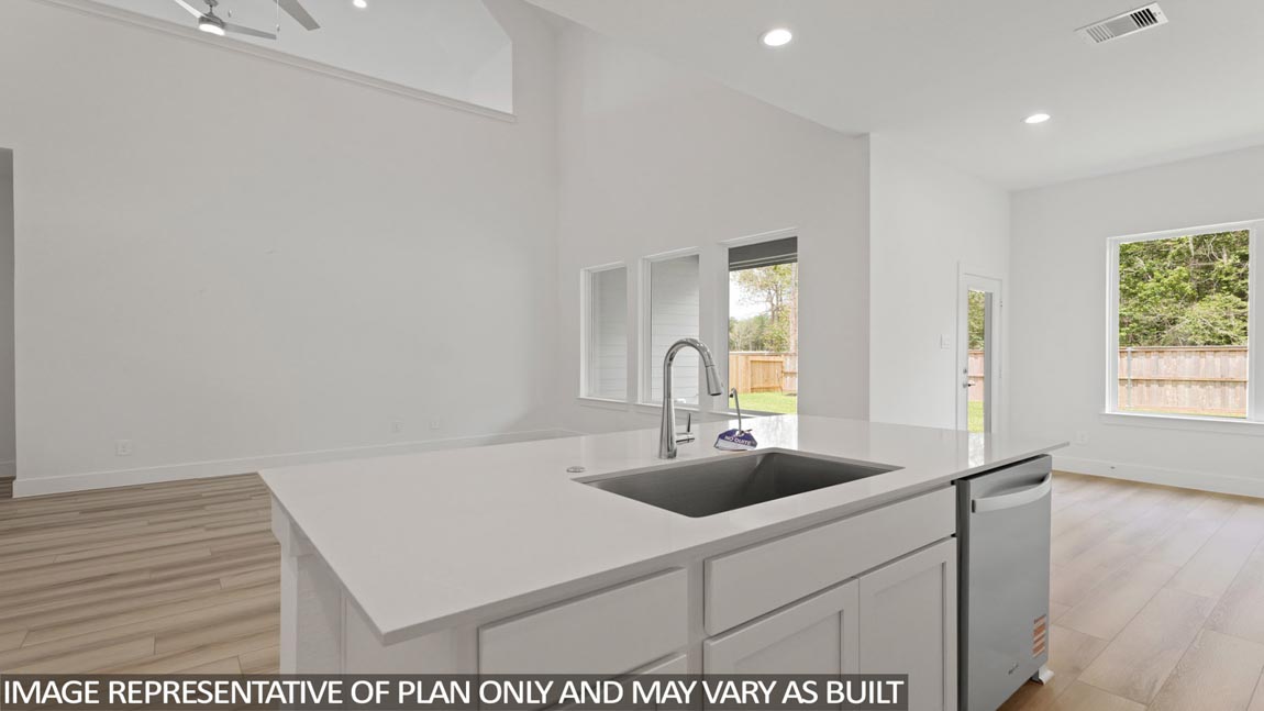 Open concept living, dining, and kitchen area