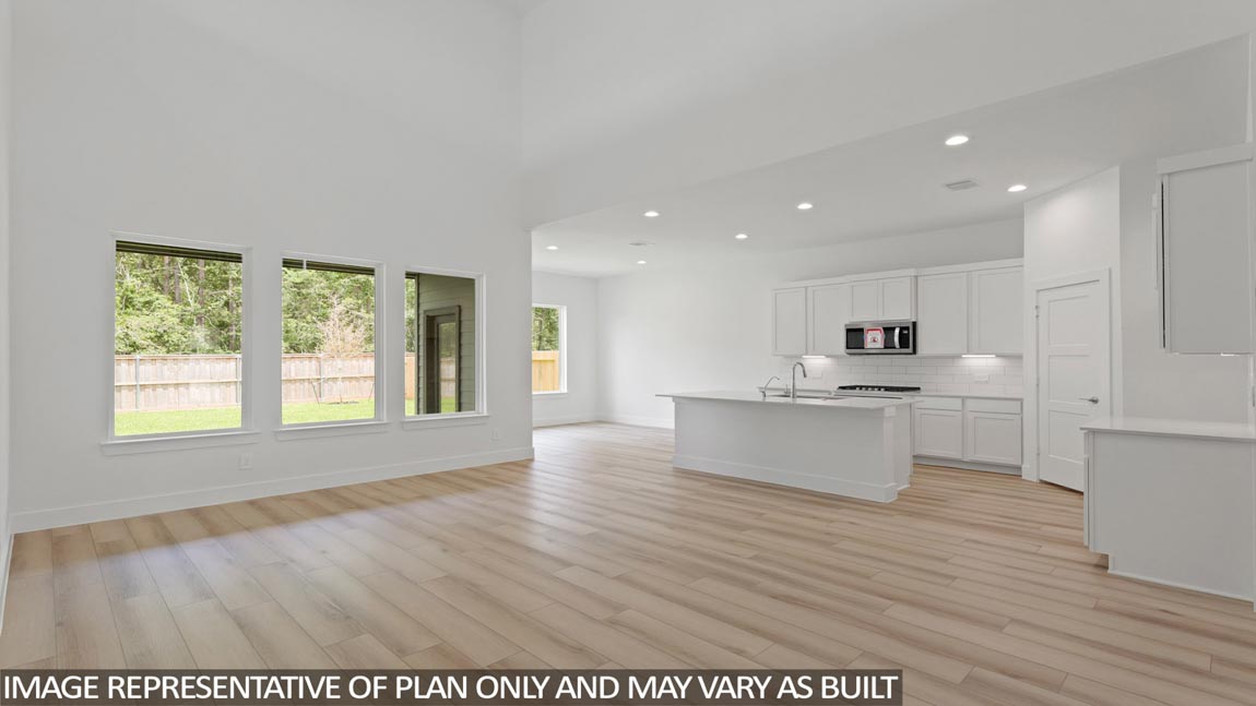 Open concept living, dining, and kitchen area