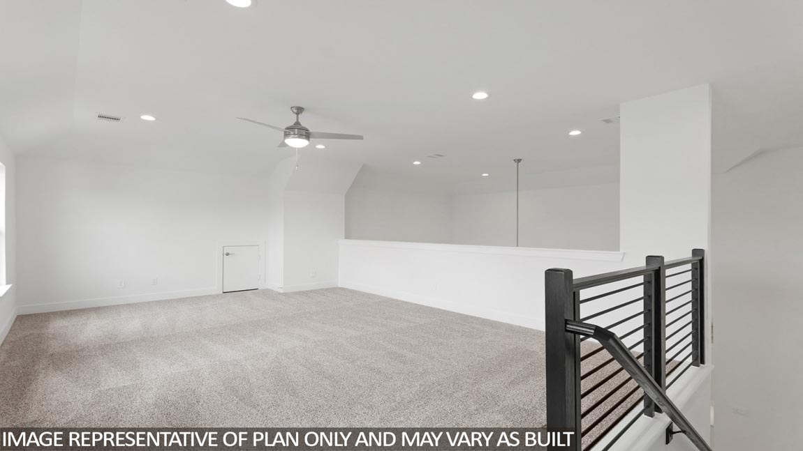 Second story game room with carpet flooring