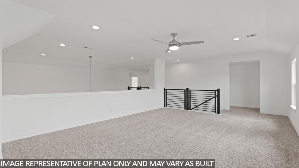 Second story game room with carpet flooring