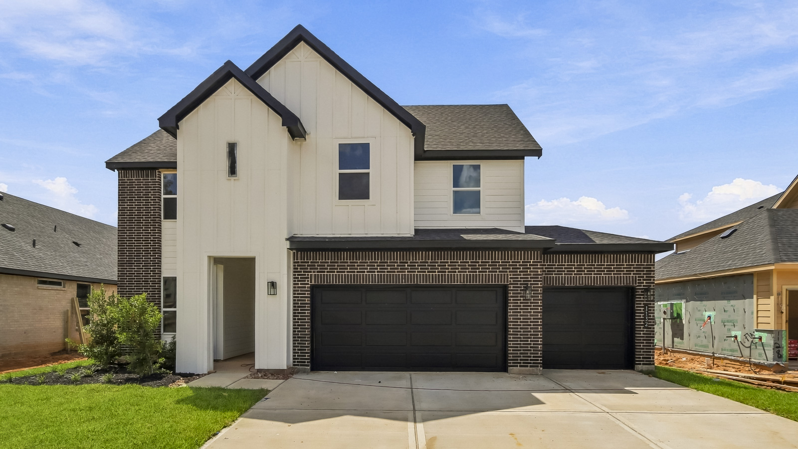 Two story home with three car garage