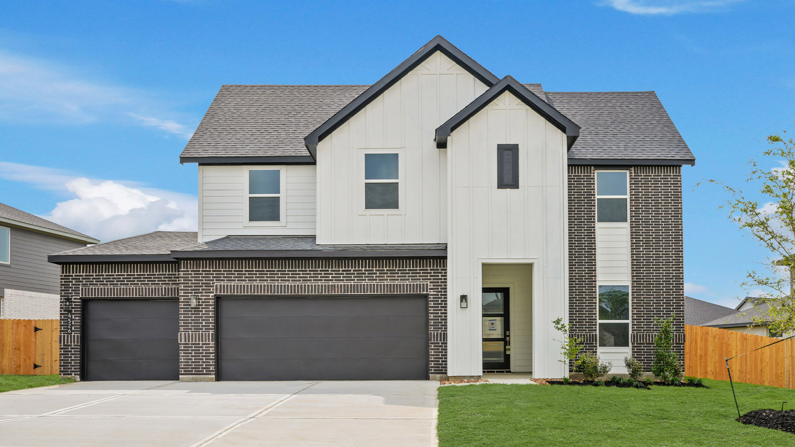 Two story home with three car garage