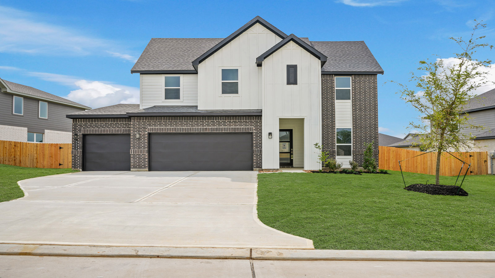 Two story home with three car garage