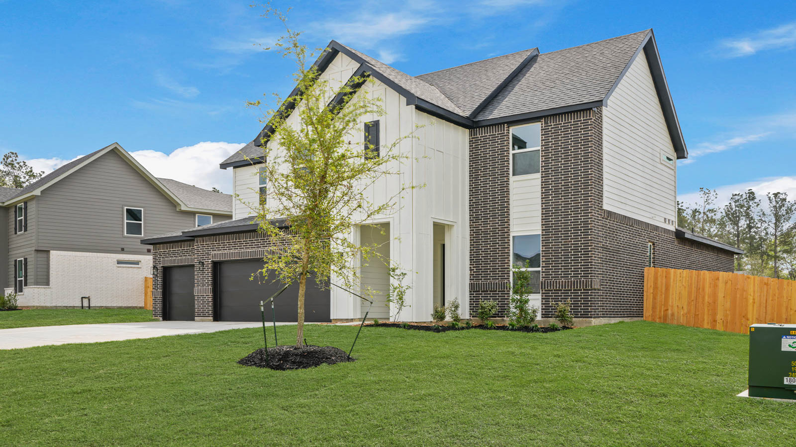 Two story home with three car garage