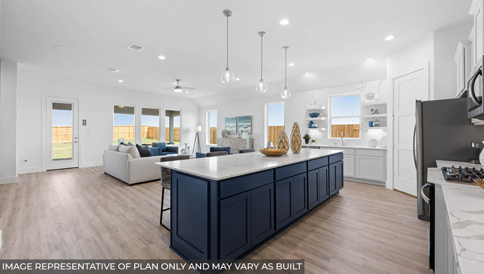 Open concept living, dining, and kitchen area