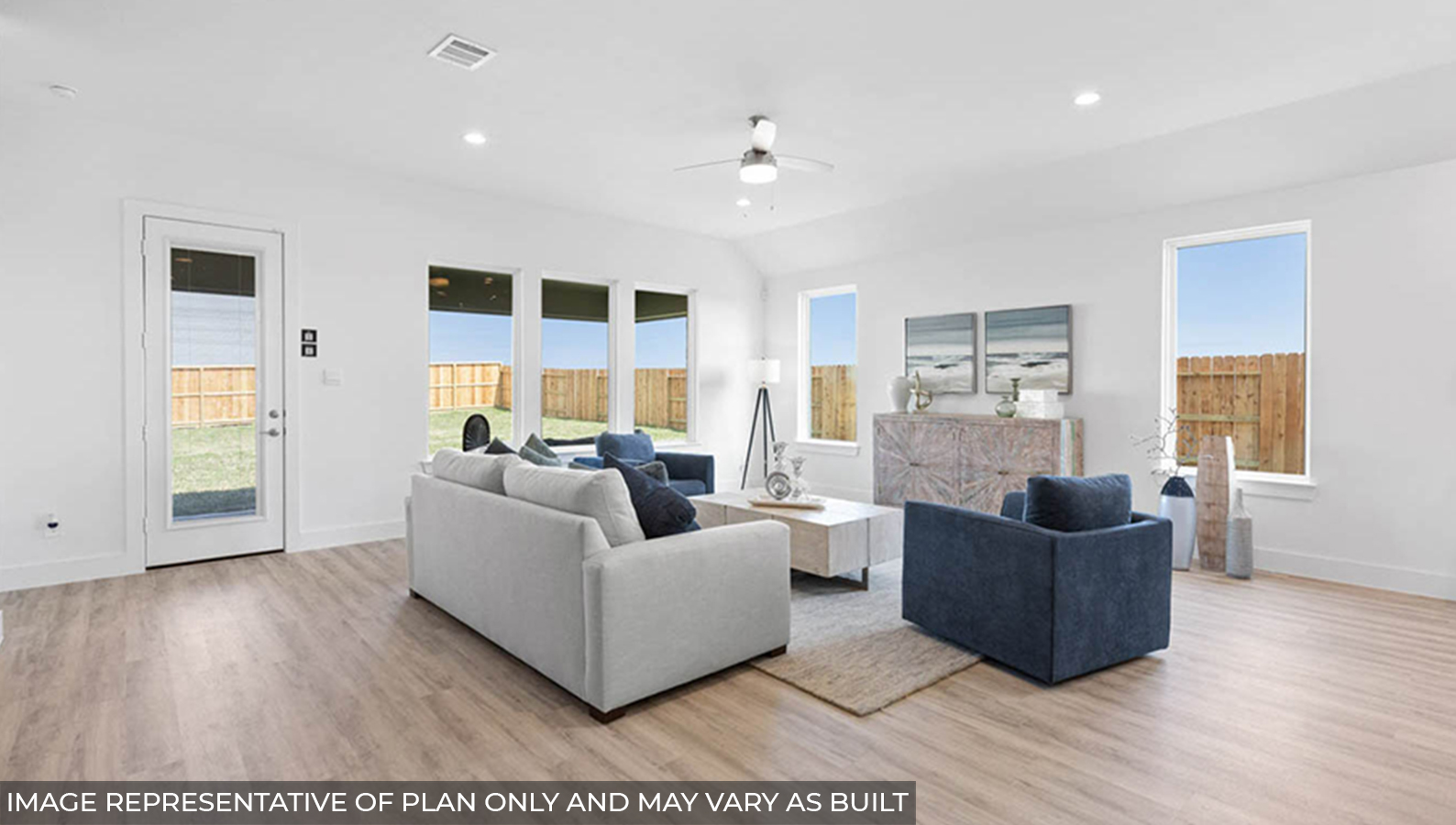 Open concept living, dining, and kitchen area