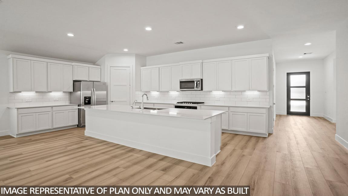 Open concept living, dining, and kitchen area