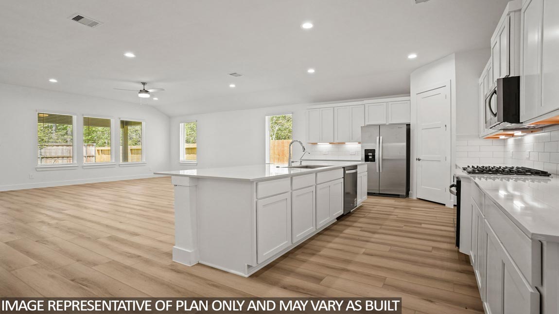 Open concept living, dining, and kitchen area