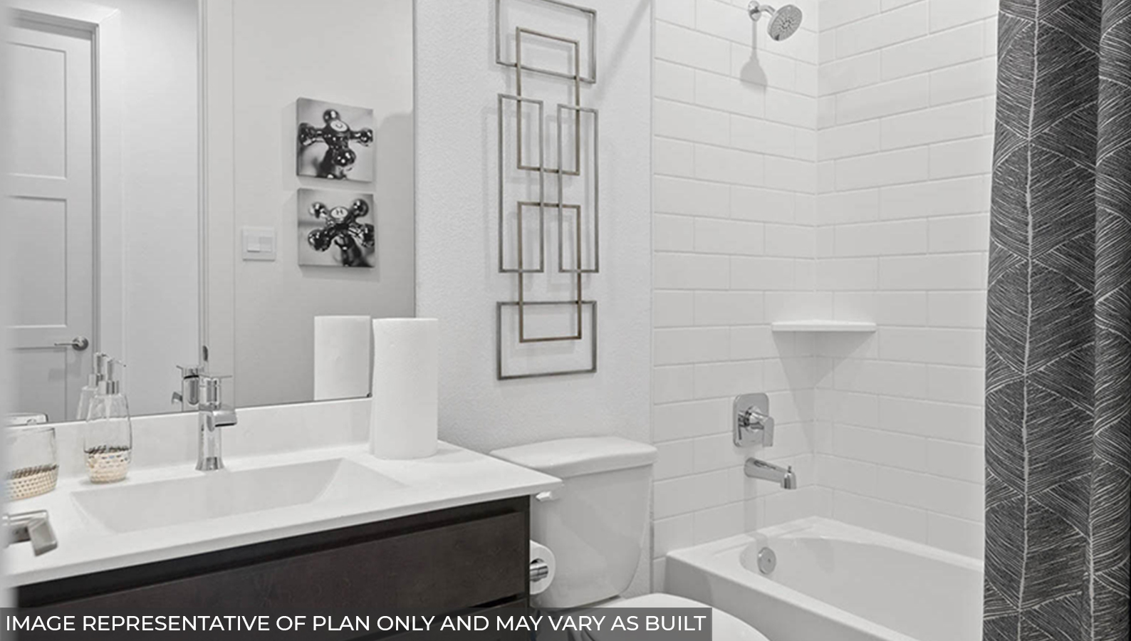 Secondary bathroom with a tile tub/shower combo.