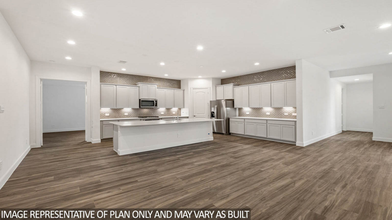 Open concept living, dining, and kitchen area