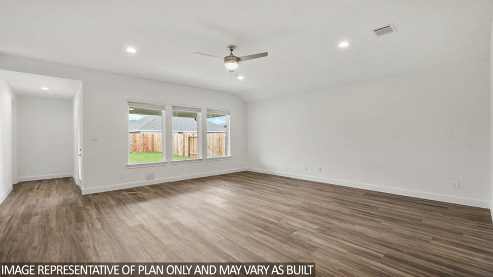 Open concept living, dining, and kitchen area