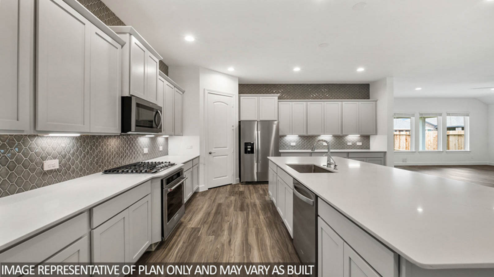 Open concept living, dining, and kitchen area