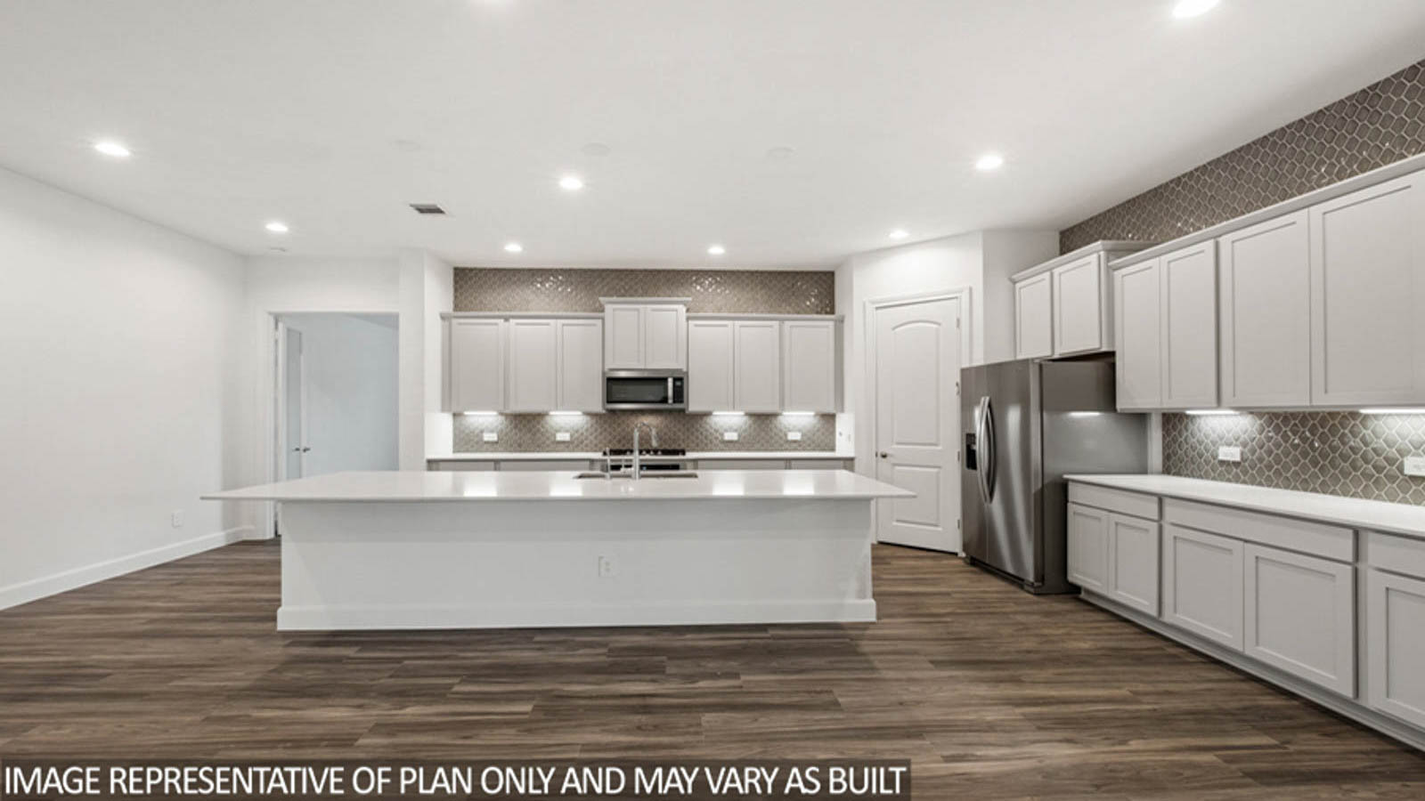 Open concept living, dining, and kitchen area