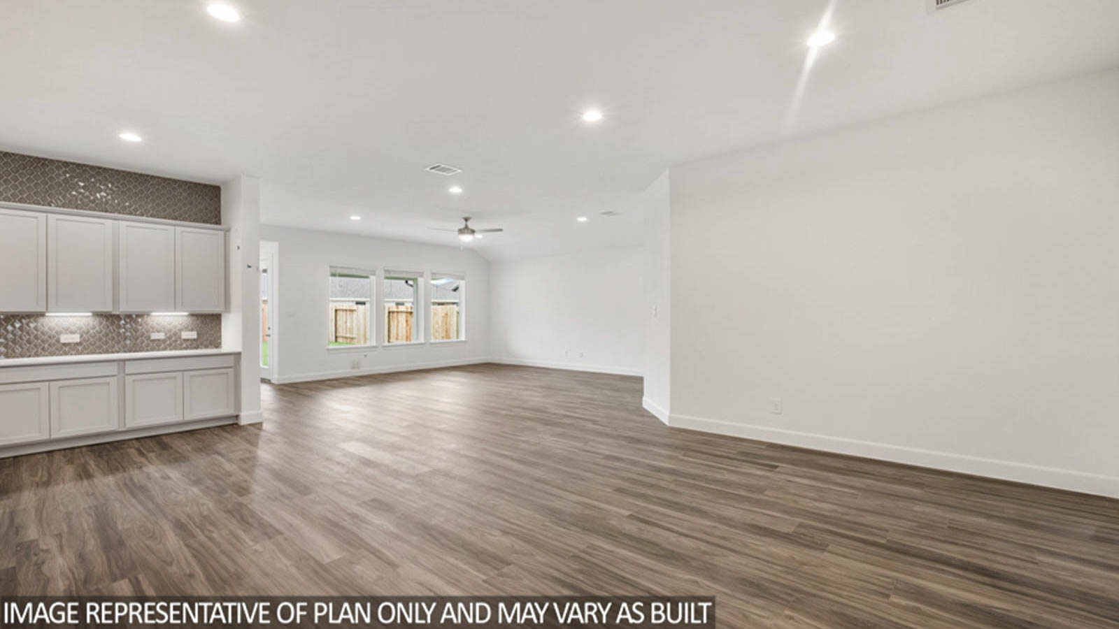 Open concept living, dining, and kitchen area