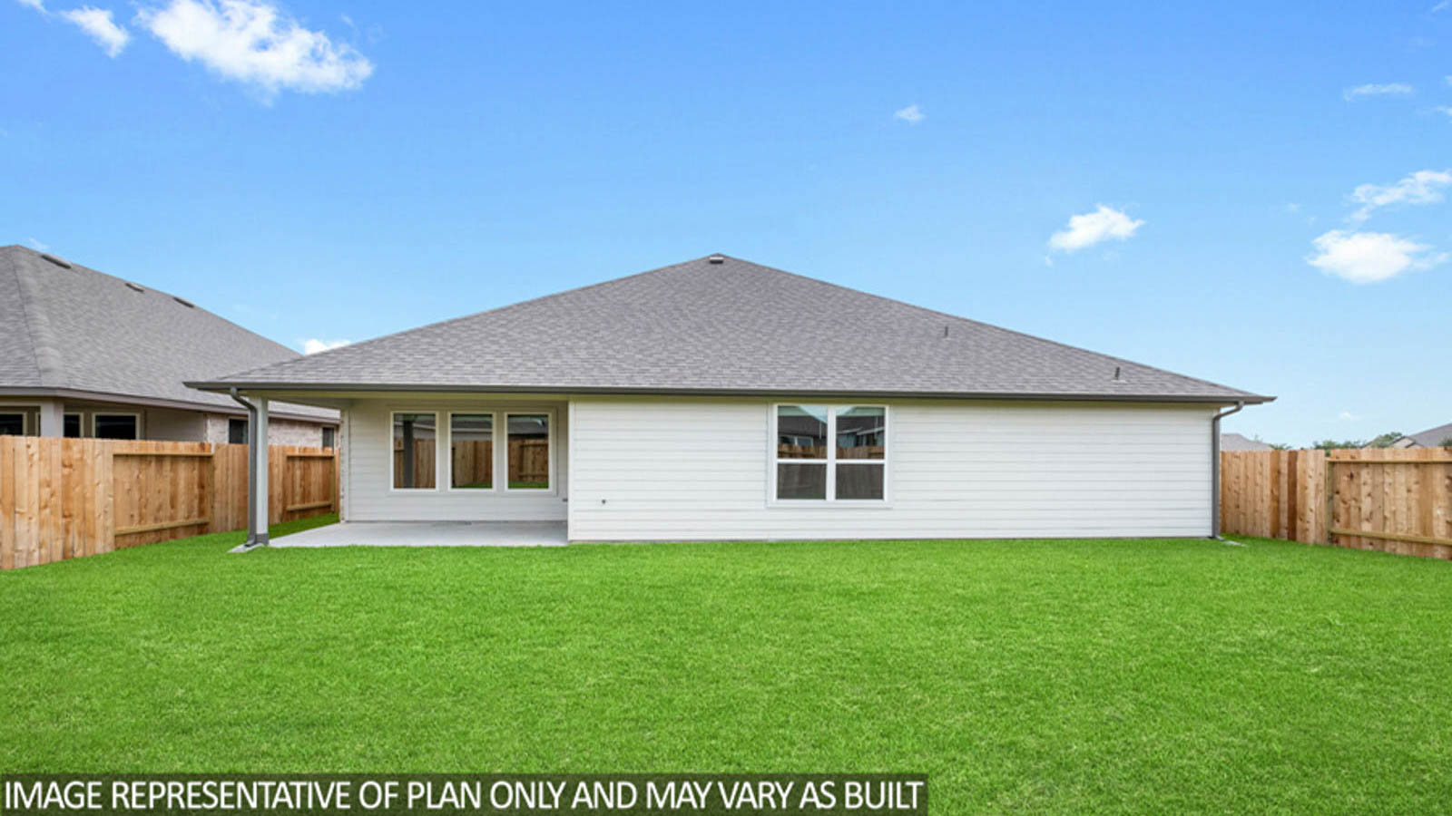Spacious backyard with back patio and overhead light.
